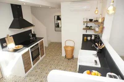 a kitchen with a sink and a counter top at Ze Perfect Place - Vieux Nice - Exceptionnel Appartement - Calme et Terrasse avec vues in Nice