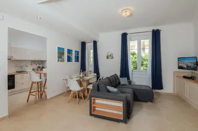 a living room with a couch and a table at 