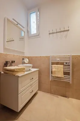 a bathroom with a sink and a mirror at 