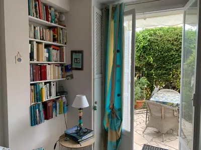 a room with bookshelves filled with books at 