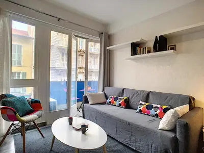 a living room with a couch and a table at Nestor&Jeeves - NEVADA SUITE - Central - Close sea in Nice