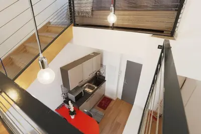 an overhead view of a living room with a red couch at Patio Wilson in Nice