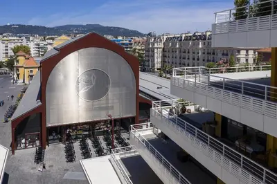 a building with a face on the side of it at Student Factory Nice in Nice