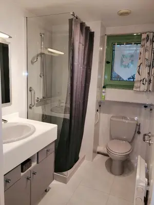 a bathroom with a toilet and a sink and a shower at Studio cosy à Villefranche sur mer in Villefranche-sur-Mer