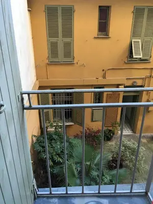 a balcony in a building with green plants at Heart of Nice Harboor cosy and central in Nice