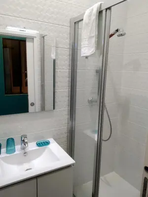 a bathroom with a shower and a sink at la terrasse in Nice