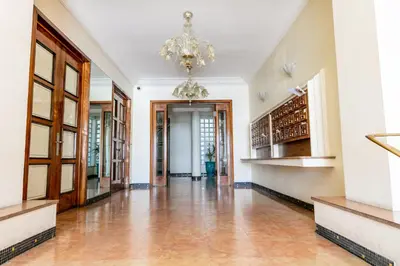 a hallway of a building with a chandelier at LE FLORIDE AP4156 Nice, by Riviera Holiday Homes in Nice