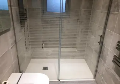 a shower stall with a toilet in a bathroom at Nice Jean Médecin in Nice
