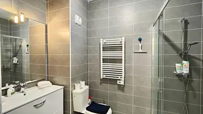 a bathroom with a shower and a toilet and a sink at Alex Nice Studio in Nice