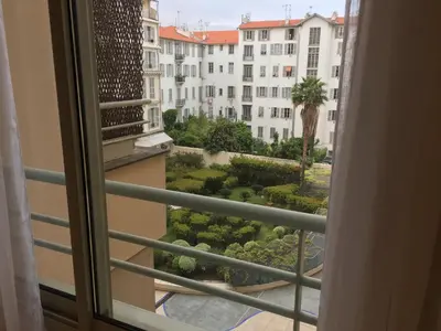 a view from a window of a building at Quiet flat next to the beach in Nice