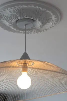 a ceiling with a light hanging from a ceiling at Port, vue mer et confort et parking in Nice