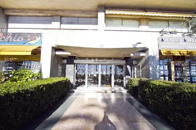 a entrance to a building with bushes in front of it at PROMENADE HOLIDAY - PALATIN PROMENADE in Nice