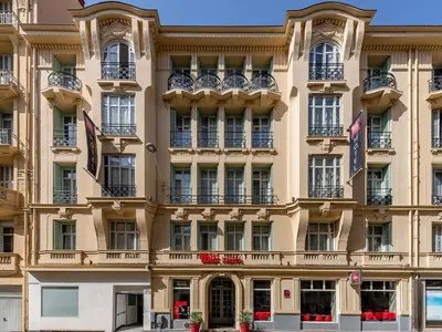 a facade of a building with windows and balconies at ibis Nice Centre Notre Dame in Nice