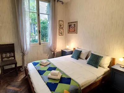 a bedroom with a large bed with towels on it at Nestor&Jeeves - DALPOZZO GRANDE - Central - Close beaches in Nice