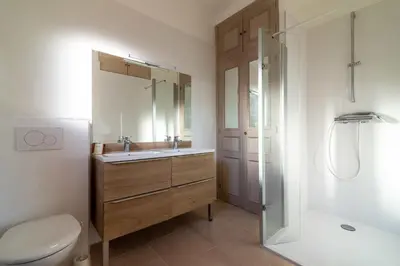 a bathroom with a sink and a toilet and a shower at Villa Primavera Splendid villa with sea view in Saint-Jean Cap Ferrat in Saint-Jean-Cap-Ferrat