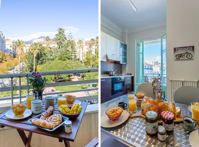 a table with breakfast food on it in a kitchen at MY CASA - VICTOR HUGO - Beautiful Apartment - View over Garden in Nice