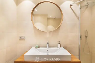 a bathroom with a sink and a mirror at Villa Artemys - Five Stars Holiday House in Saint-Jean-Cap-Ferrat