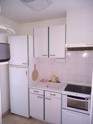 a bathroom with a toilet and a sink and a tub at Studio F1 vue mer a 30m des plages in Cagnes-sur-Mer