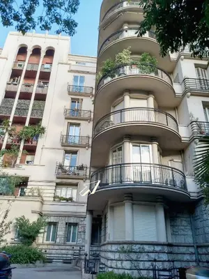 an apartment building with balconies on the side of it at Le Palladium quartier Tzaréwitch Nice in Nice