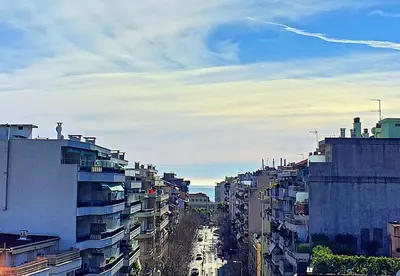 a view of a city street with tall buildings at Nestor&Jeeves - SUNSET TERRACE - Central - Free parking - Top floor in Nice