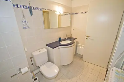 a bathroom with a toilet and a sink at PROMENADE HOLIDAY - GRIMALDI CITY CENTER in Nice