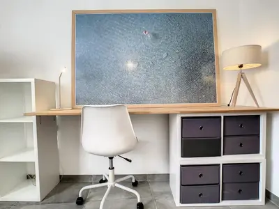 a desk with a white chair and a television on it at Nestor&Jeeves - BOW WINDOW BUFFA - City center - Very close beach in Nice