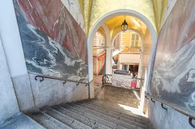 an entrance to a building with an archway at Studio en plein cœur de la vieille ville à Nice in Nice