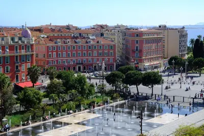 a view of a city with a fountain and buildings at Nestor&Jeeves - BERLIOZ SUITE - Downtown - Close beaches in Nice