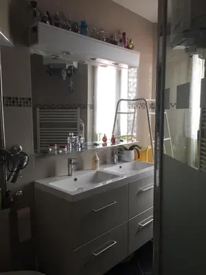 a bathroom with a sink and a mirror at Appart hyper centre Nice in Nice