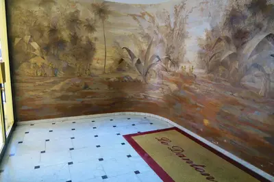 a room with a painting on the wall and a rug at Nestor&Jeeves - CORAL SEA TERRACE - Central - Very close beaches in Nice