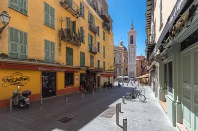 an empty street in a city with buildings at 8 CONDAMINE - Stylish in Old Town - 2 pièces - 300m de la mer in Nice