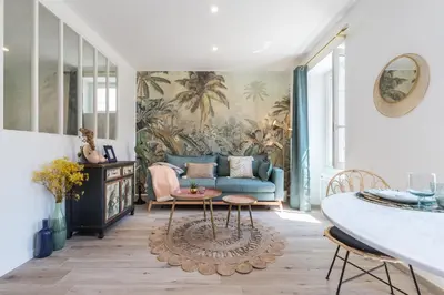 a living room with a couch and a table at Lovely Apartment City Center Heart - AC in Nice