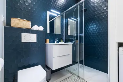 a bathroom with a sink and a shower at Cosy 1 Bdr Place Garibaldi & Place du Pin in Nice