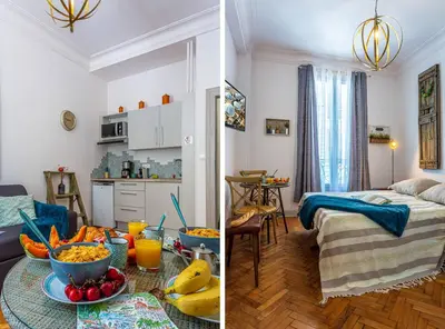 a kitchen and a living room with a table with food at MY CASA - DIJON - Near Train Station - Malaussena in Nice