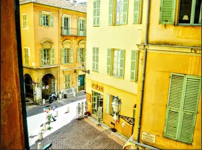a view from a window of a street with buildings at Ze Perfect Place - Spacieux appartement - Cours Saleya - 2 CHB - 2 SDB - AC in Nice