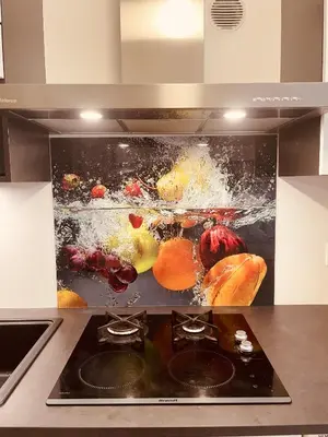a kitchen counter with a picture of fruit on it at Le GIULIANO in Nice