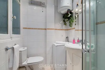 a bathroom with a toilet and a sink and a shower at Studio Imperator Five stars holiday house in Nice