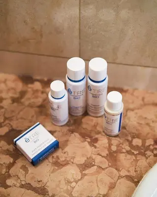a group of four bottles of medicine sitting on a counter at Sunlight Properties - Marinette - Port area, 2 Bedrooms, sleep 6, sea view in Nice