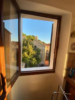 a window in a room with a view at CHARMANT HOME-Azur Charmant in Nice