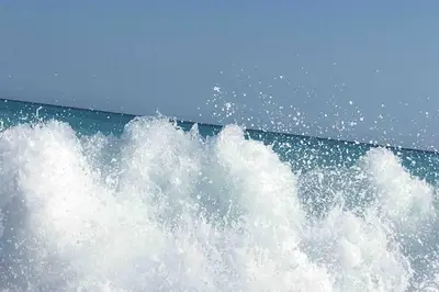 a foaming wave in the ocean on a boat at CHARMANT HOME-Azur Charmant in Nice