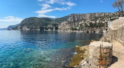 a view of a body of water with a mountain at T2 RDJ sur la Côte d'Azur tout confort in Cagnes-sur-Mer