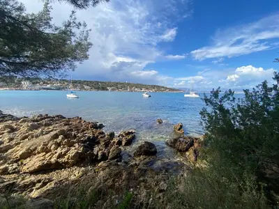 a view of a body of water with boats at T2 RDJ sur la Côte d'Azur tout confort in Cagnes-sur-Mer