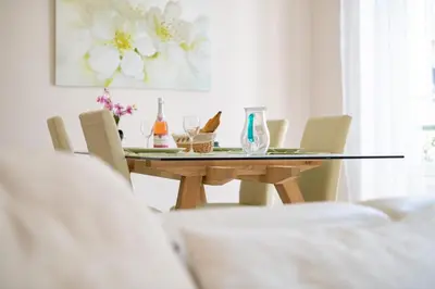 a dining room table with chairs and a table and a table and chairsktop at 