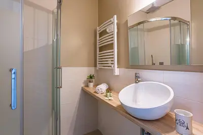 a bathroom with a sink and a shower at MY CASA - GAMBETTA 33 - 5min walk to beach in Nice