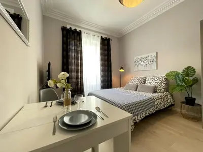 a kitchen and living room with a bed in a room at Nice Renting - BUFFA - Cosy Studio fully equipped - Beach & Negresco in Nice