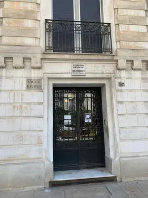 a black door on a building with a sign on it at Nice Renting - BUFFA - Cosy Studio fully equipped - Beach & Negresco in Nice