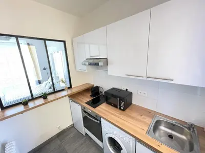 a kitchen with a sink and a microwave at Nice Renting - BUFFA - Cosy Studio fully equipped - Beach & Negresco in Nice