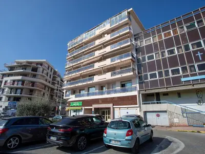 a building with a sign for a shopping center at Apartment Etoile de Mer by Interhome in Cagnes-sur-Mer