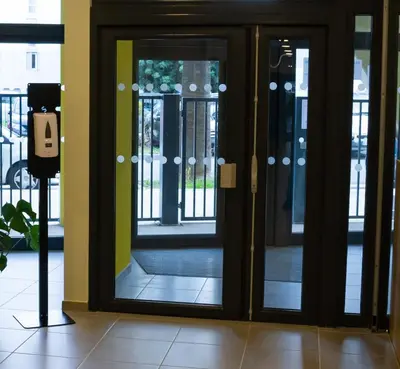 a pair of glass doors in a building at PARME ETAPE in Nice