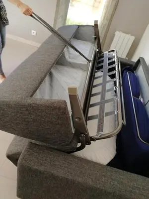 an escalator with a suitcase on top of it at Lovely Studio & Garden - près des plages Cagnes-sur-Mer in Cagnes-sur-Mer